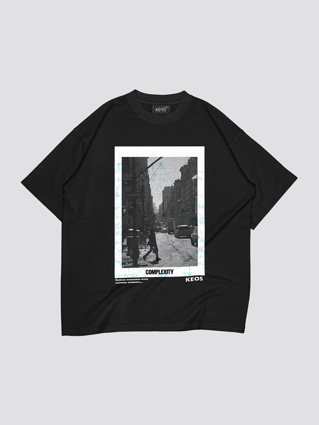 Black t-shirt with a graphic print on a light gray background
