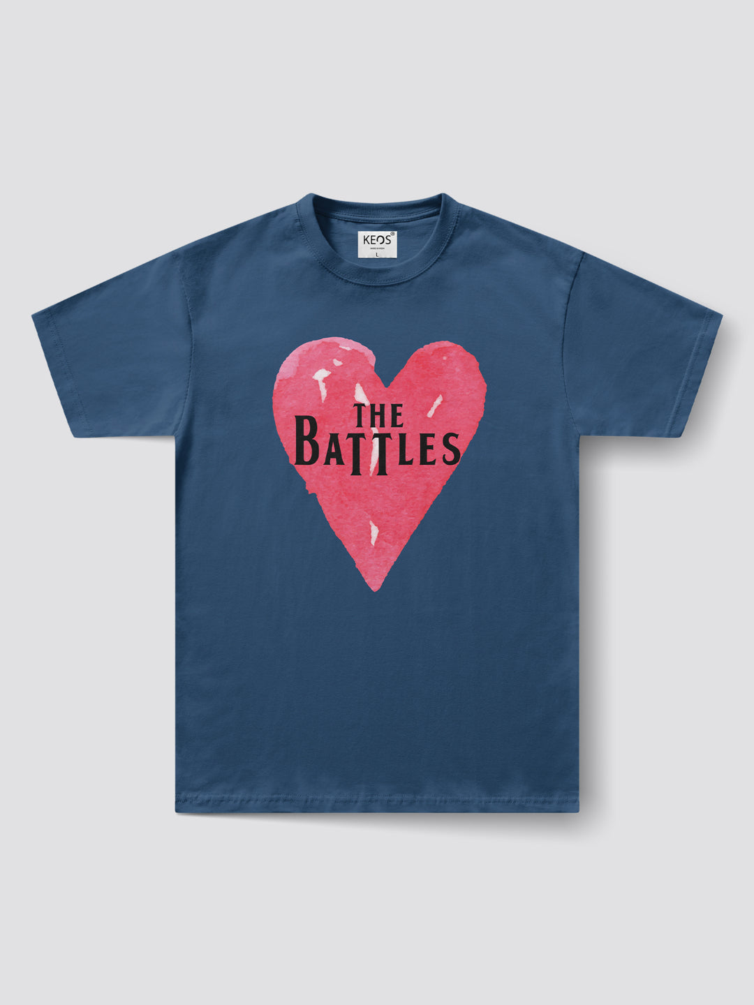 Navy blue t-shirt with a red heart and 'The Battles' text on a light gray background