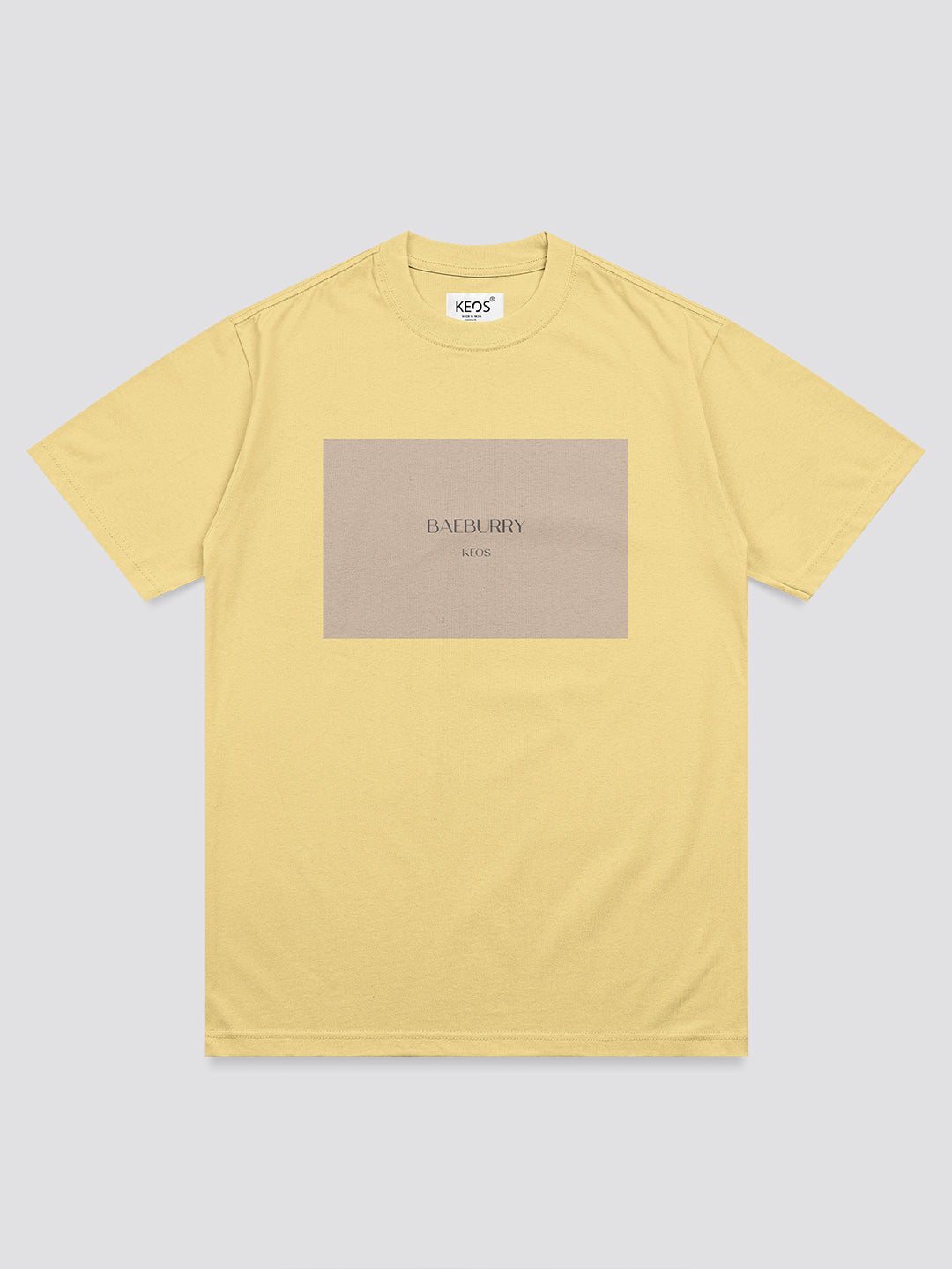 Yellow t-shirt with Burberry logo on a light gray background