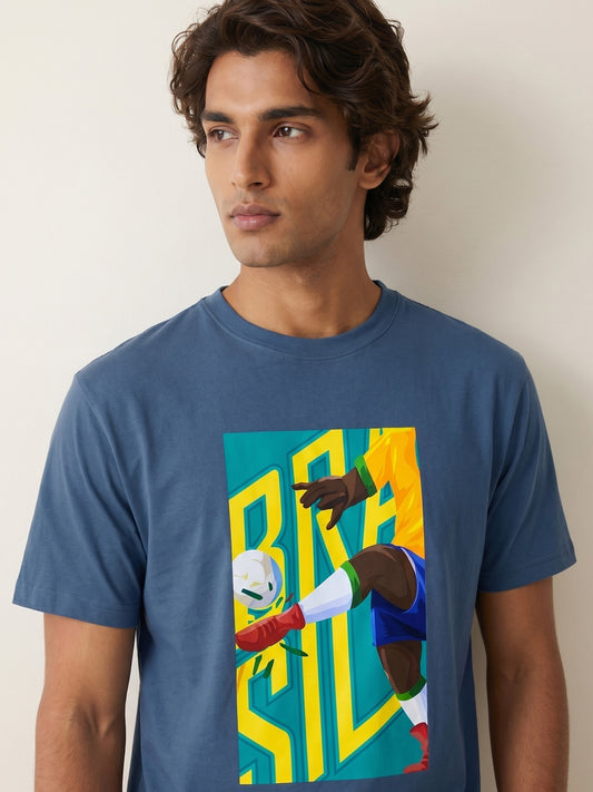 Man wearing blue t-shirt with Brasil written with a football print