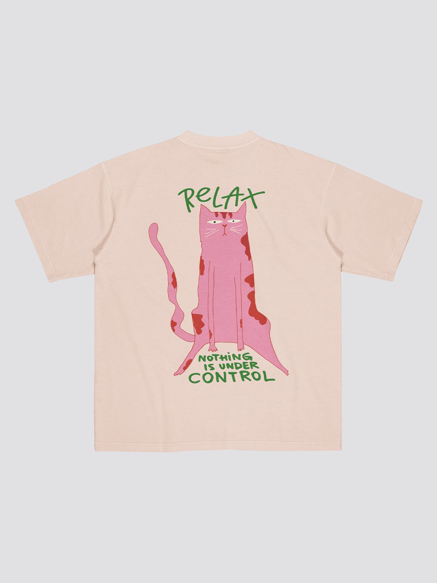 Beige t-shirt with a pink cat graphic and text on a light gray background