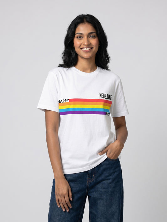 Indian female model wearing Keos Happy Pride white graphic t-shirt with rainbow stripe print, styled with blue denim jeans.