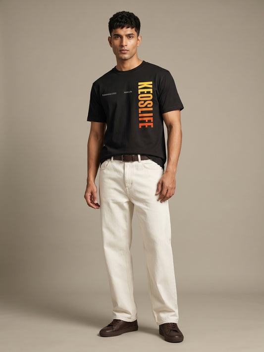 Keos Pride Month special black cotton graphic t-shirt for men, featuring vertical KEOSLIFE gradient print with cream denim styling.