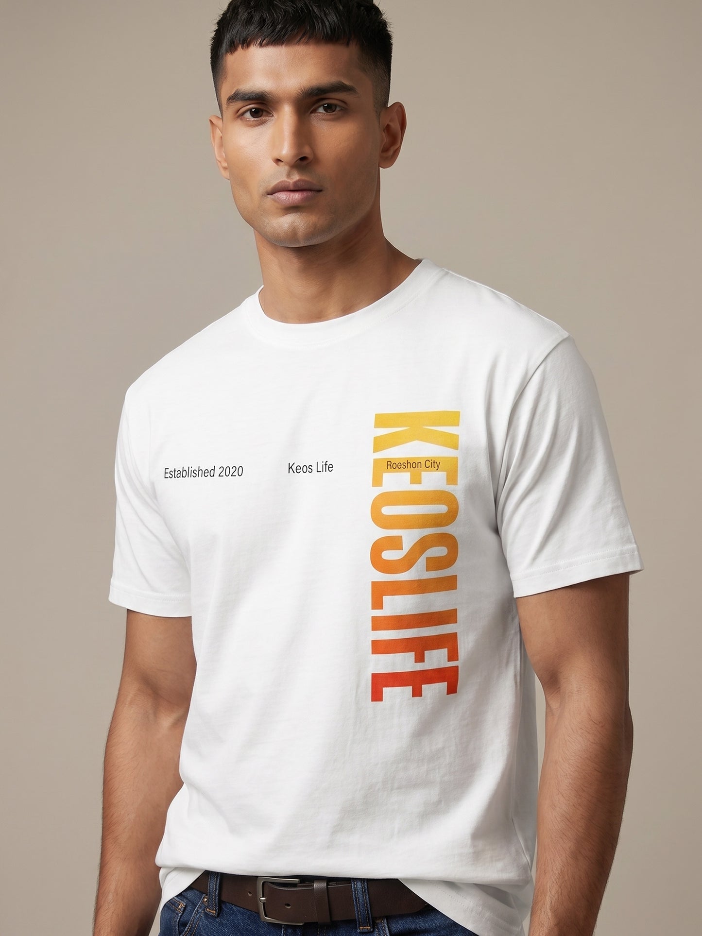 Close-up of Keos Pride Bold white cotton t-shirt showing vertical KEOSLIFE gradient print, crew neck, half sleeves, and soft fabric texture.