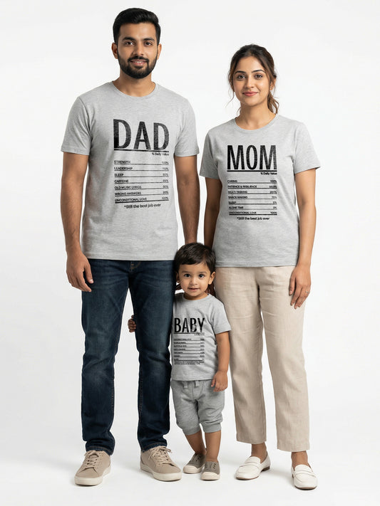 Family of three wearing matching t-shirts with 'DAD', 'MOM', and 'BABY' text on a white background
