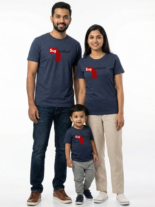 Family of three wearing matching navy blue t-shirts with a red logo on a white background