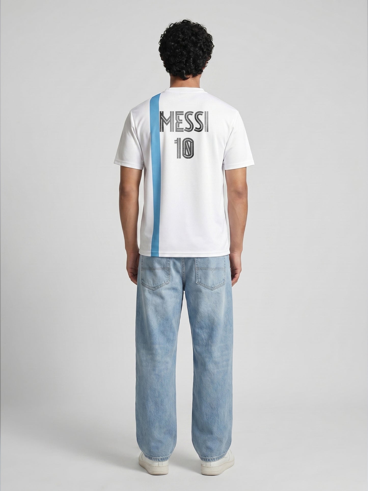 Person wearing a white sports jersey with 'Messi 10' on the back, standing against a plain background.